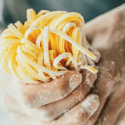 Fresh homemade pasta served at Pasta Kulture Camrose — Italian Asian fusion restaurant Alberta