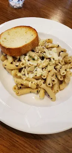 Appetizers and sides including cheesy rice balls at Pasta Kulture Alberta